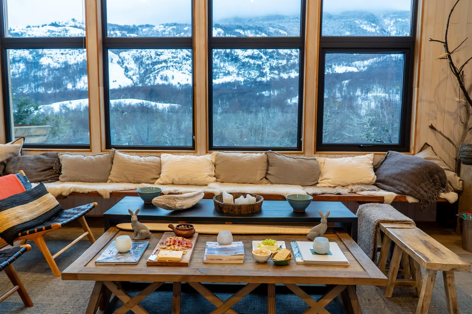 Living de Peñón Mountain Lodge con vista al paisaje invernal